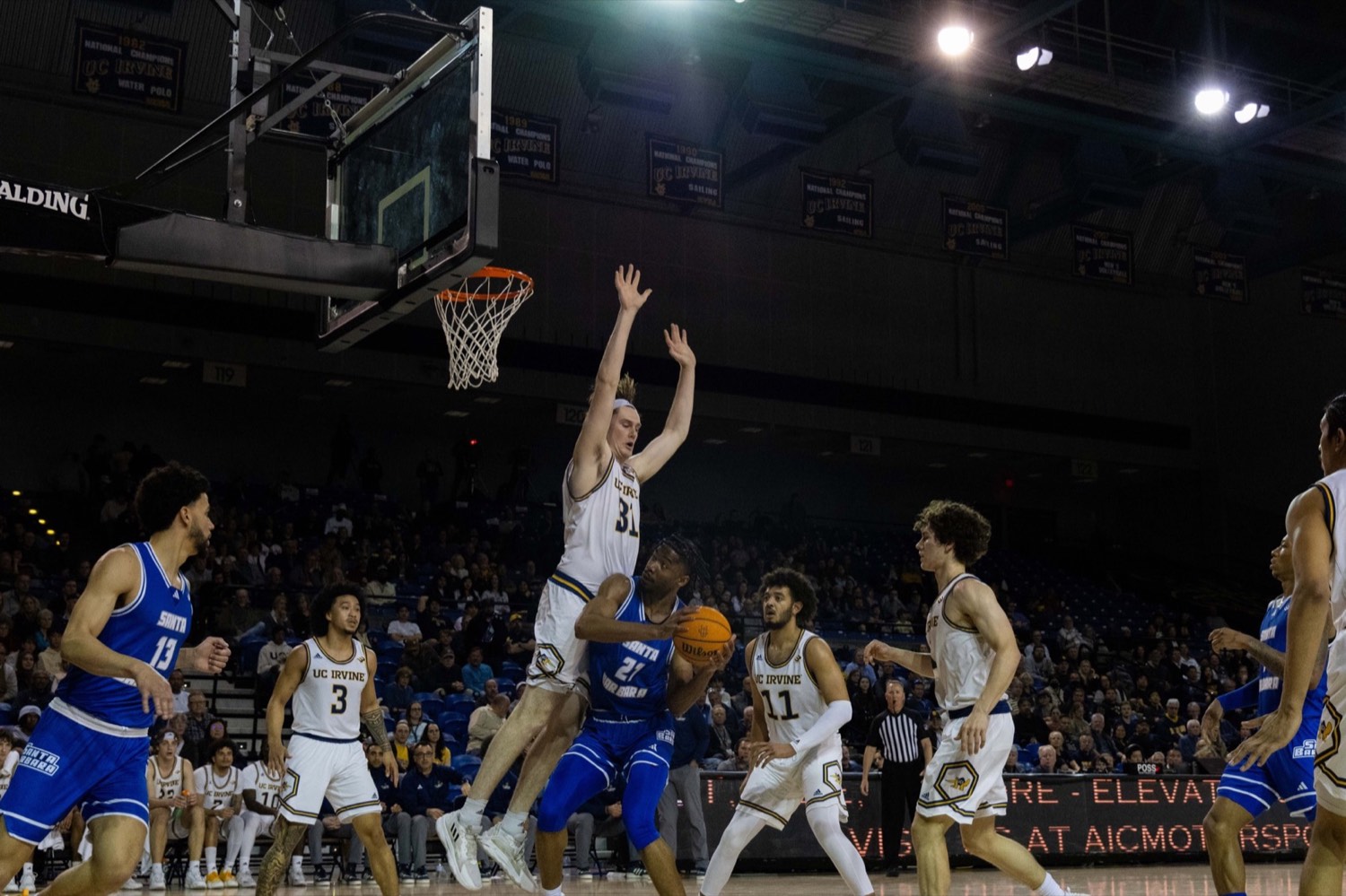 Basketball player attacking the rim